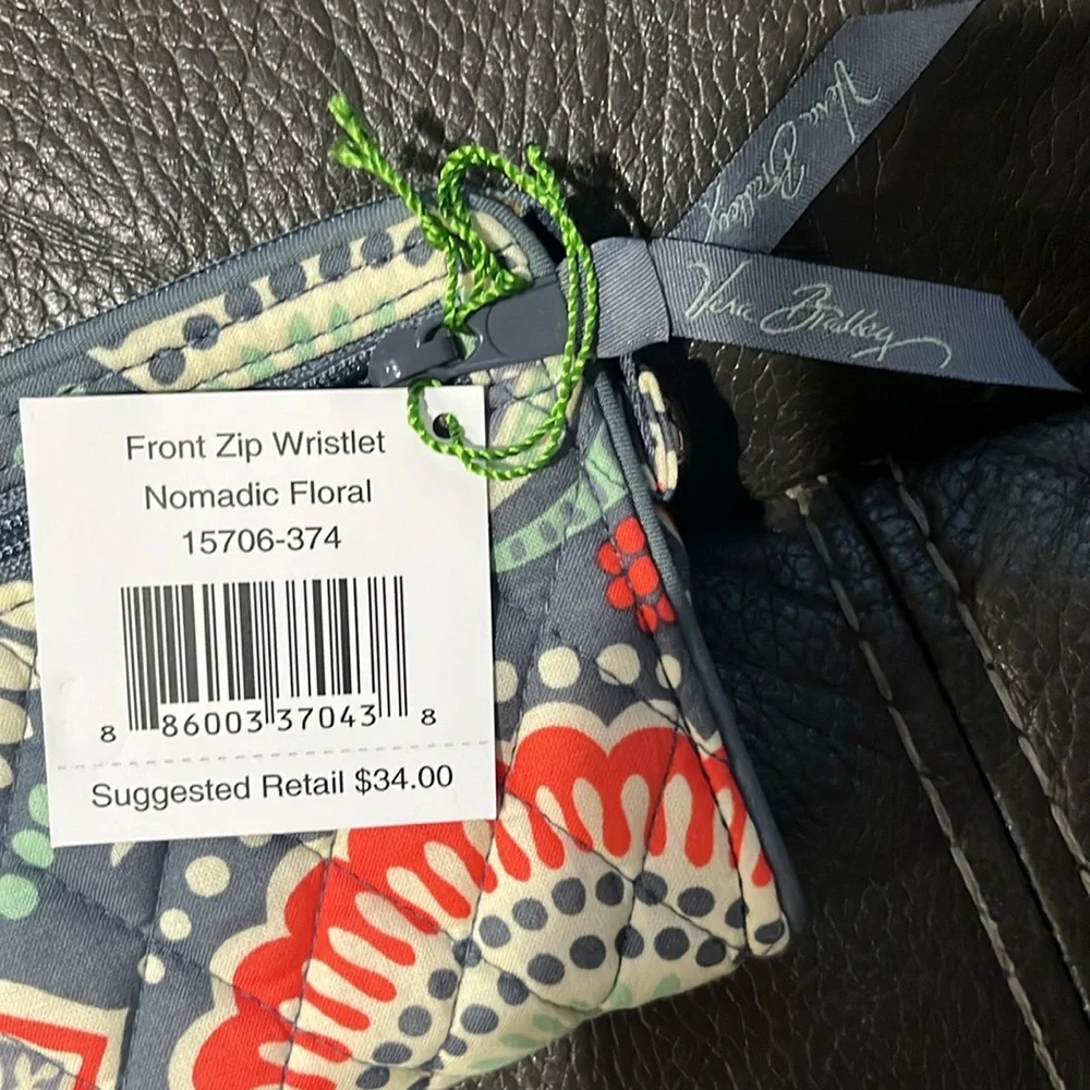 Vera Bradley front zip wallet in nomadic floral